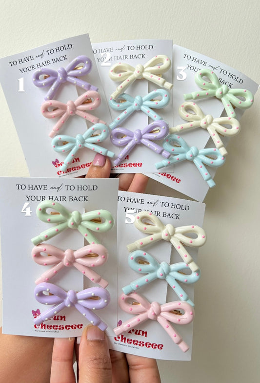 Bow alligator pins