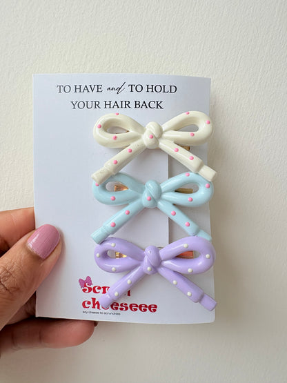 Bow alligator pins